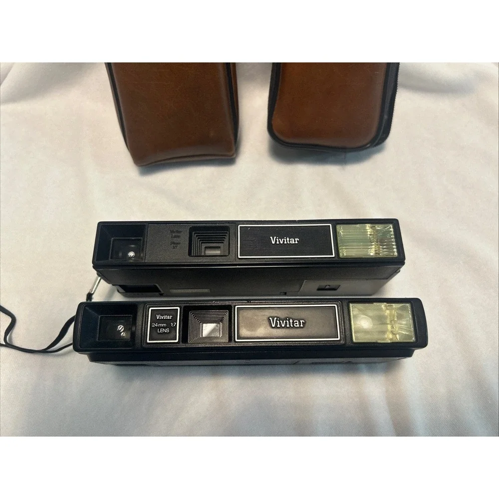 Vivitar 600 and 700 Vintage 110 Film Pocket Cameras with Brown Cases Lot of 2